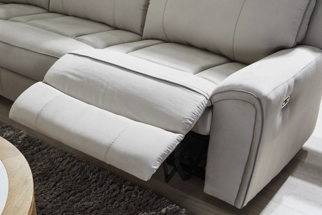 Light gray reclining sofa chaise with pull-out footrest and padded cushions
