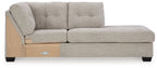 Light gray corner chaise with tufted back, track arms, and dark legs
