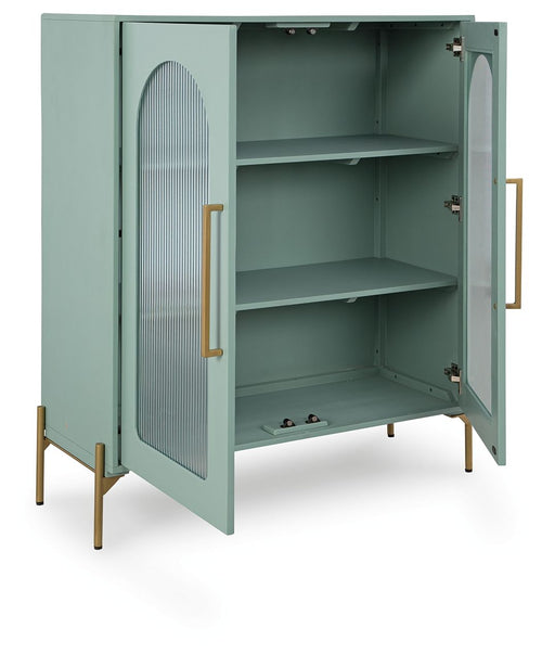Light green accent cabinet with double doors open, showing three interior shelves