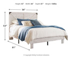 White panel bed with blue throw blanket and pillows, showing overall size