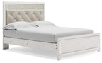 Upholstered panel bed with light gray tufted headboard and white wood frame