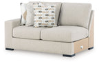 Light beige left-arm loveseat with boxy arms, two cushions, and dark base feet.