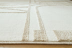 Beige rug close-up with border trim and textured flat surface
