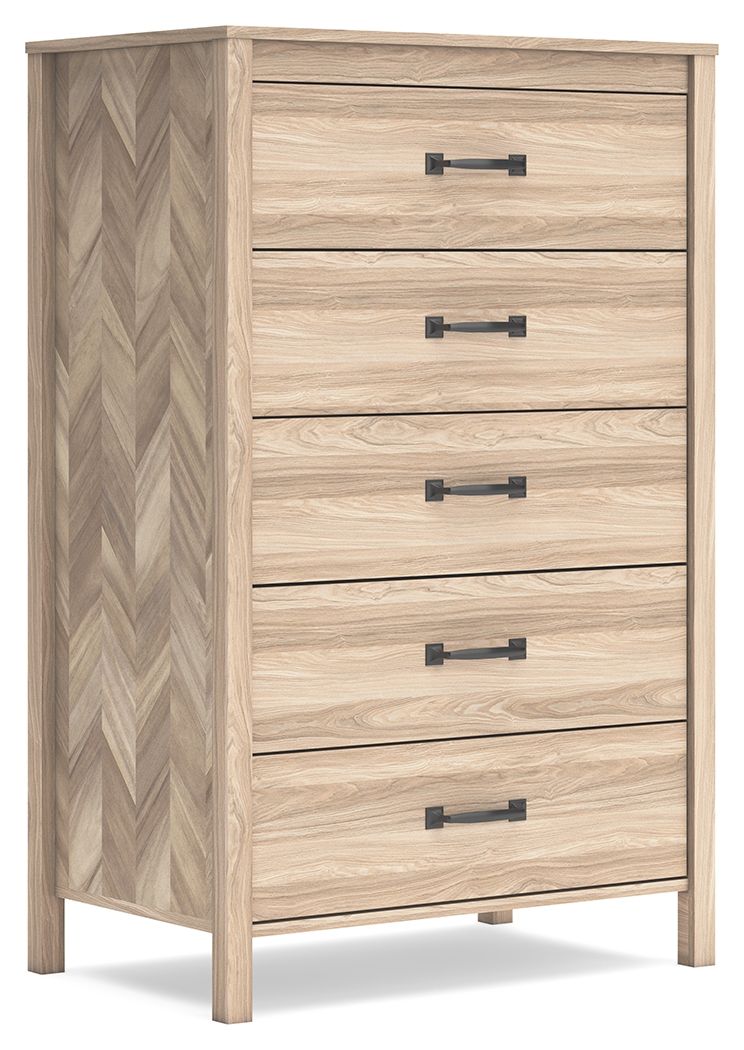 Tan five-drawer chest with black bar pulls and chevron side panel