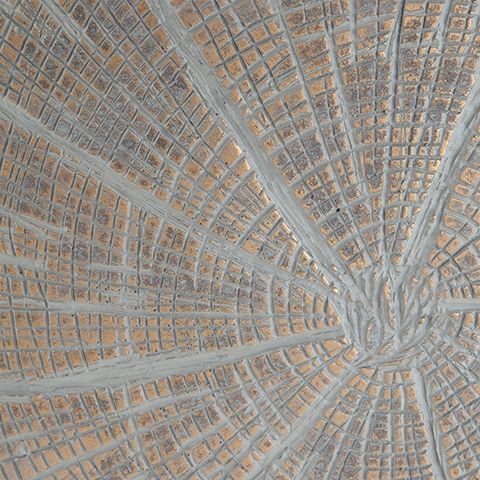 Blue-gray vase texture close-up with radial starburst mosaic pattern