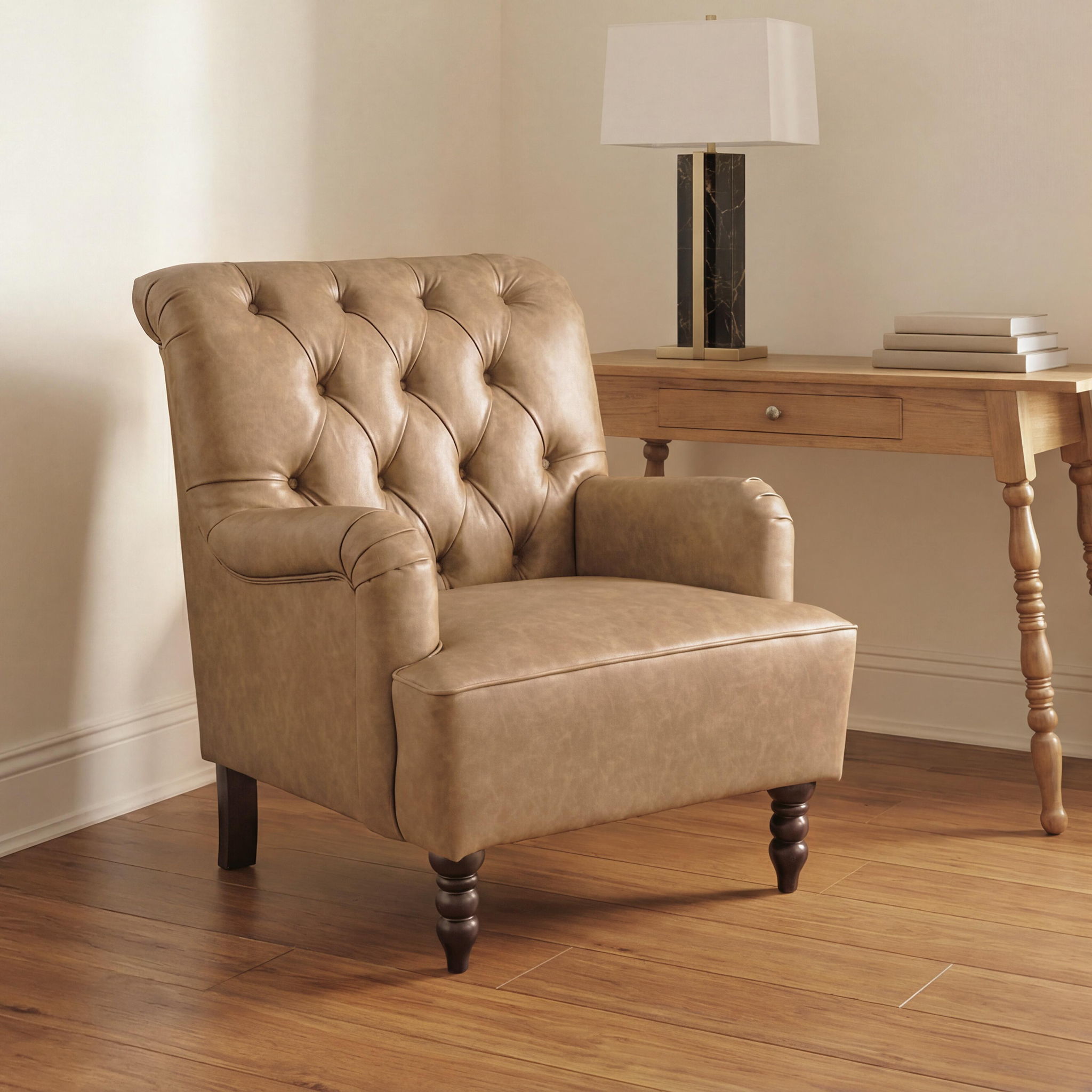 Beige upholstered accent chair with tufted back, padded arms, and dark wooden legs