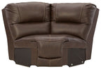 Chocolate leather-look wedge sofa with padded arms and tufted center back