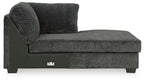 Dark gray fabric chaise with thick track arm and tall rounded back cushion, block feet.