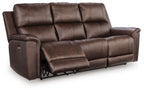 Dark brown power reclining sofa with side control panel and adjustable headrest