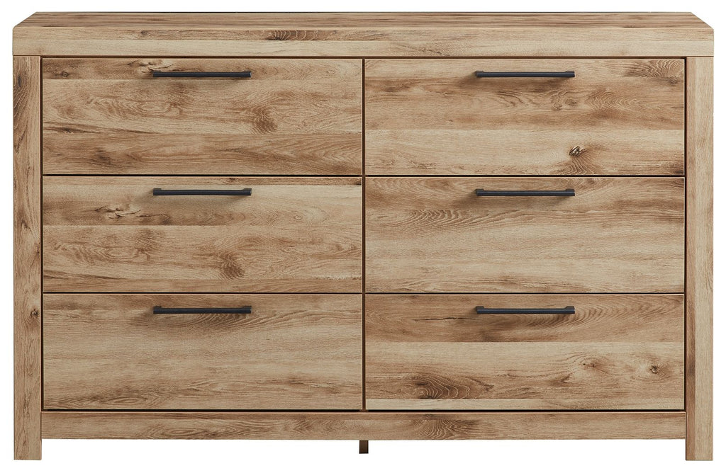 Tan wood six-drawer dresser with 6 drawers and metal bar pulls.