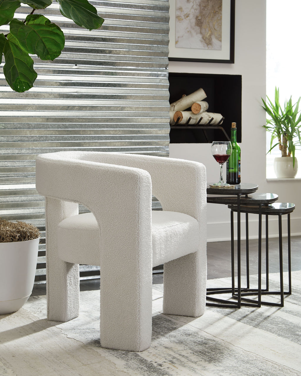 White upholstered accent chair with thick arms, cushioned seat, and square legs
