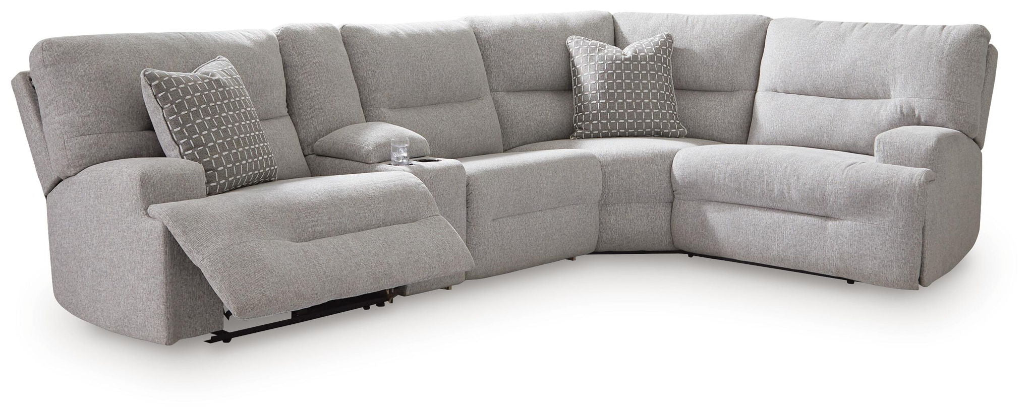 Pewter power reclining sectional sofa with curved chaise and patterned throw pillows