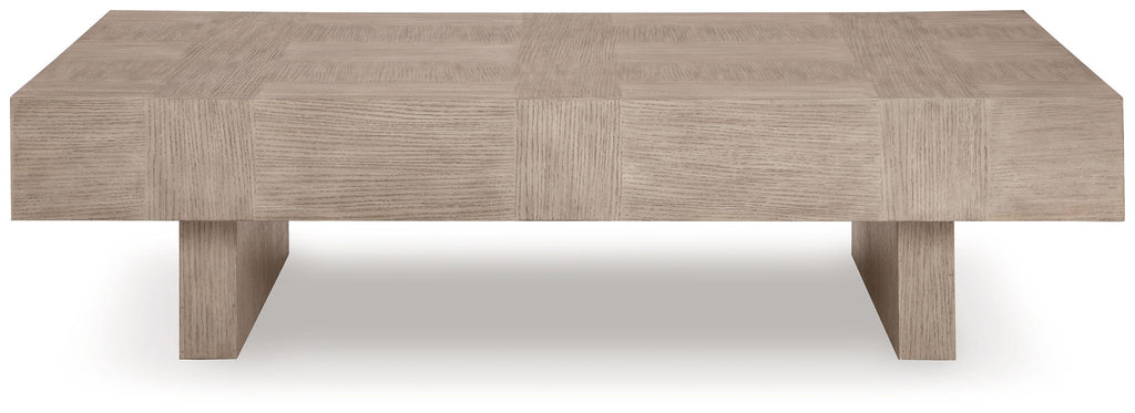Jorlaina rectangular table side view with light beige wood-look top and short legs