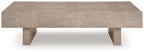 Jorlaina rectangular table side view with light beige wood-look top and short legs