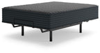 Gray hybrid mattress with black legs and dark quilted side panels