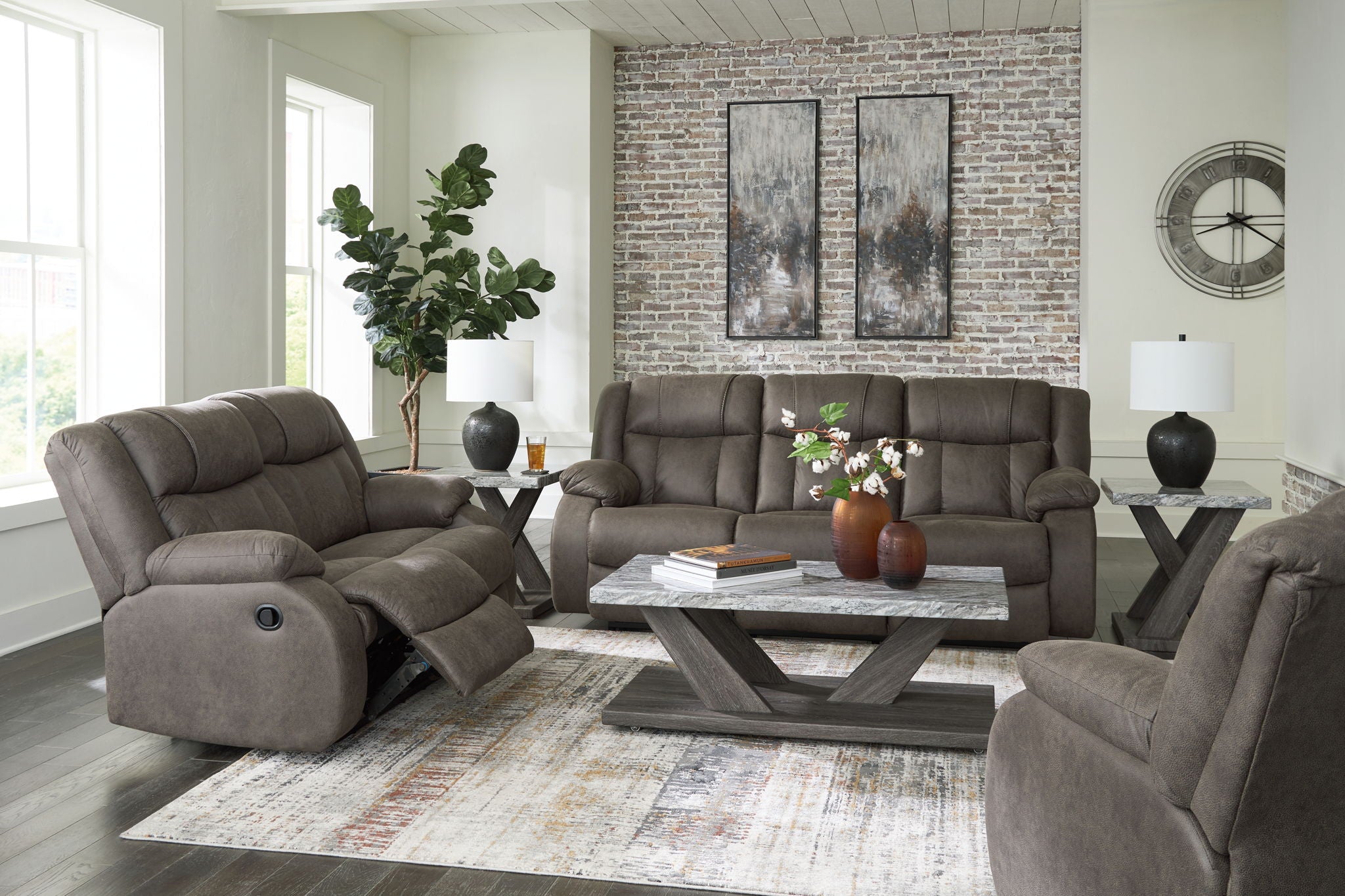 Dark gray reclining set with two recliner chairs and tufted sofa