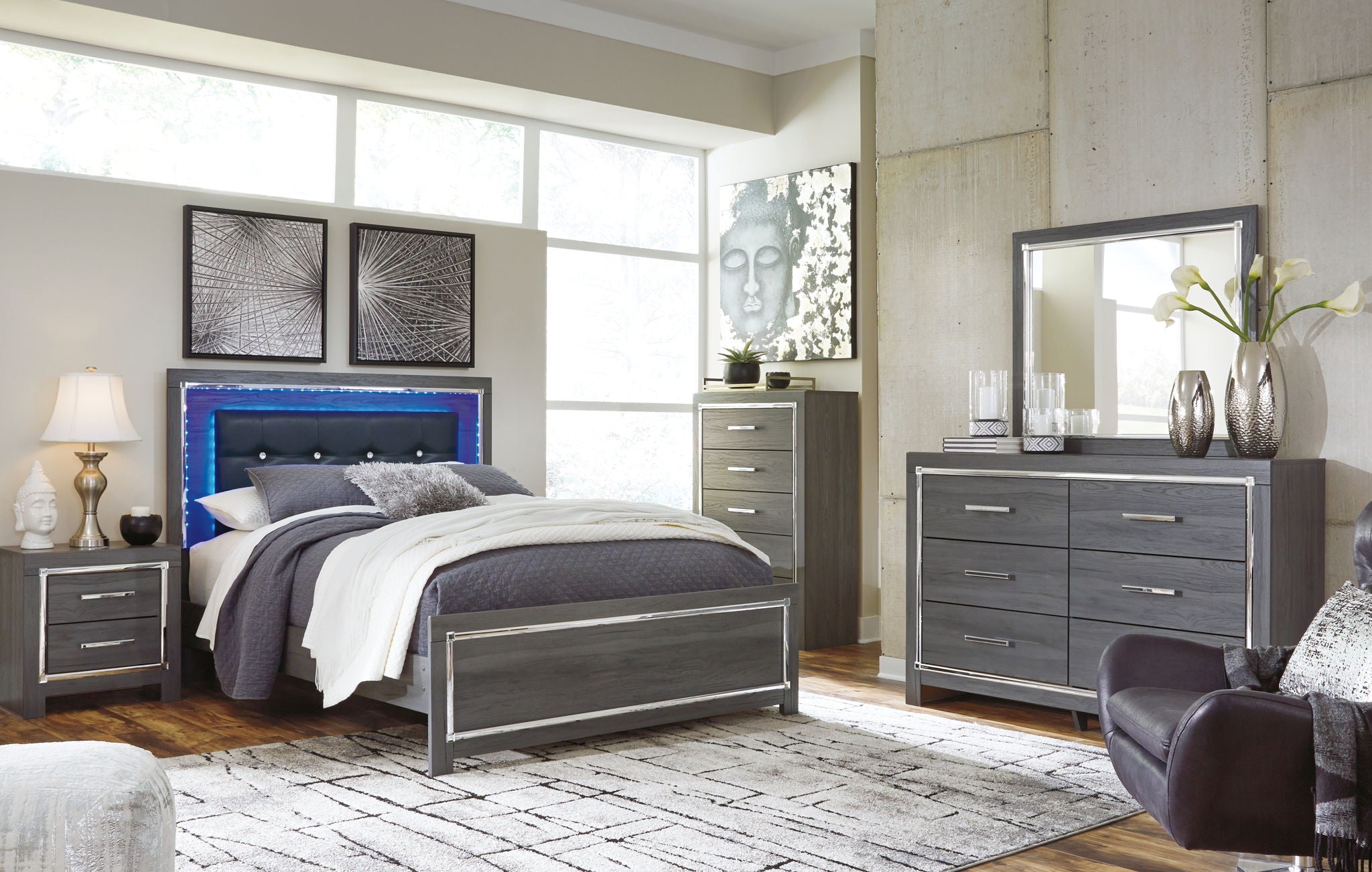 Bedroom set with dark gray platform bed, two nightstands, and matching dresser