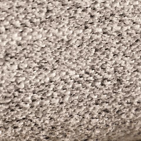 Textile upholstery swatch with speckled gray pattern, close-up