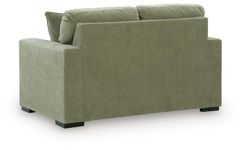 Olive green upholstered loveseat sofa with square arms and low black feet