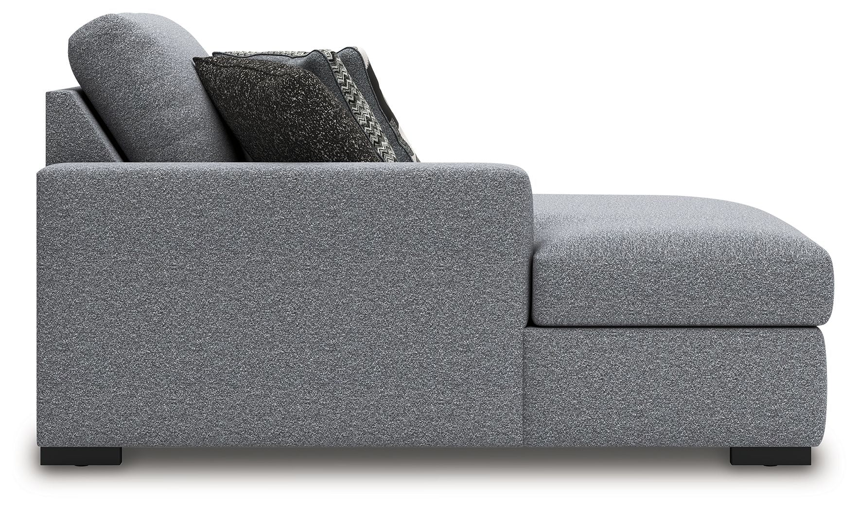 Grey upholstered chaise with curved side arm and block feet, side view