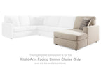 Sectional sofa corner chaise with dark gray seat and patterned throw pillow