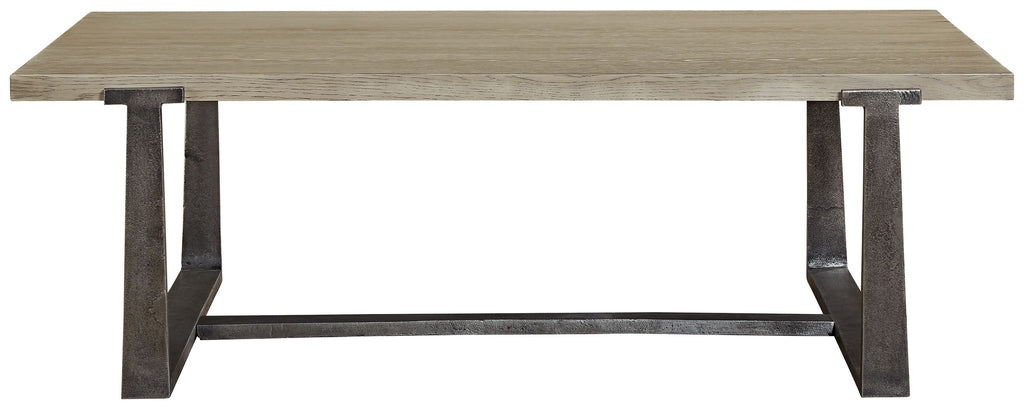 Gray rectangular cocktail table viewed from the side, dark metal legs and open base