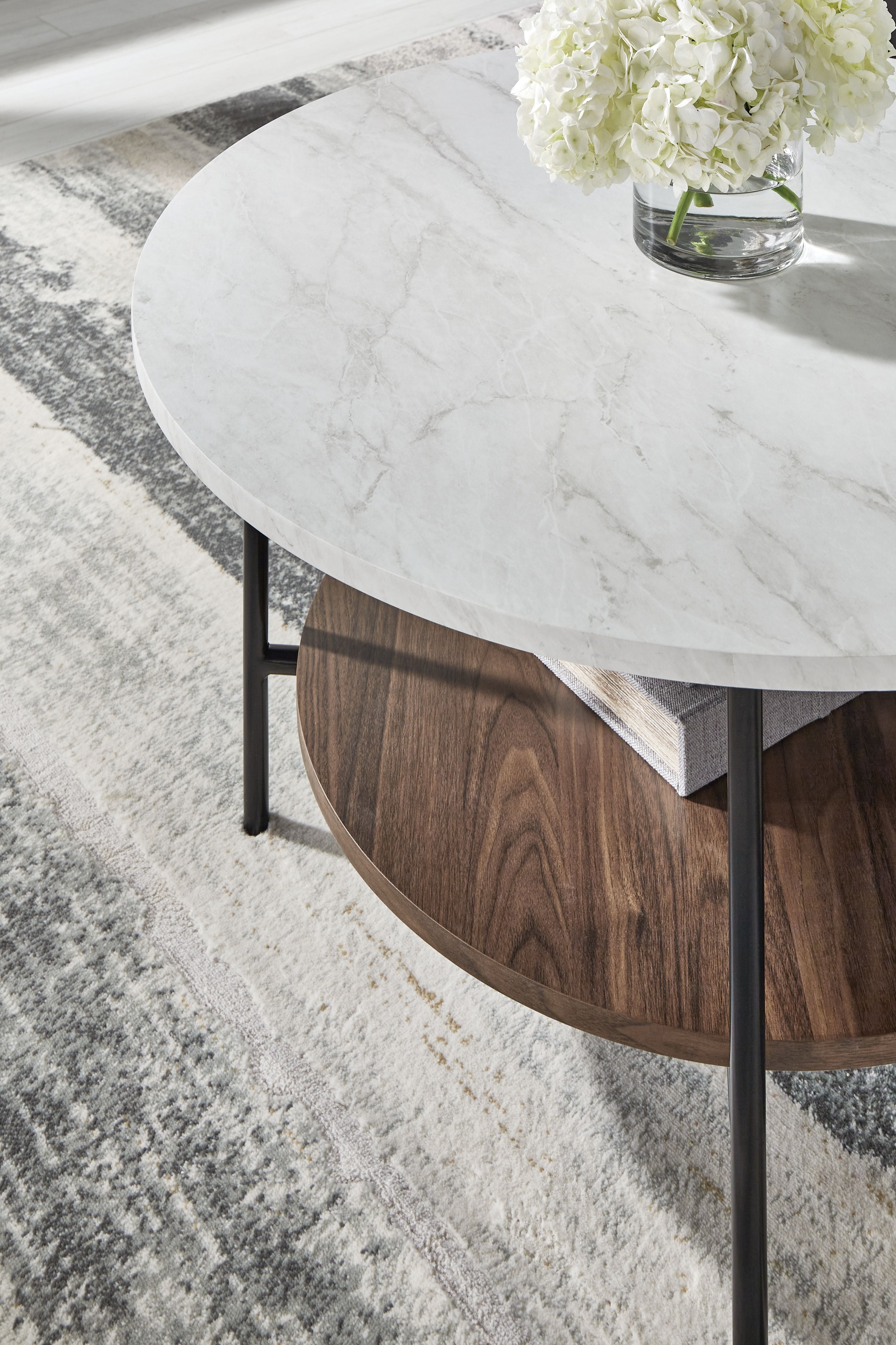 Round marble-look table top with white finish, wood wrap base, black legs