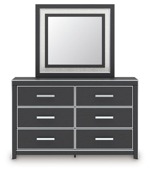 Black panel dresser with six drawers and square mirrored frame