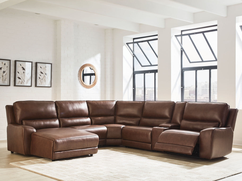 Dark brown power reclining sectional with chaise seats and wide armrests