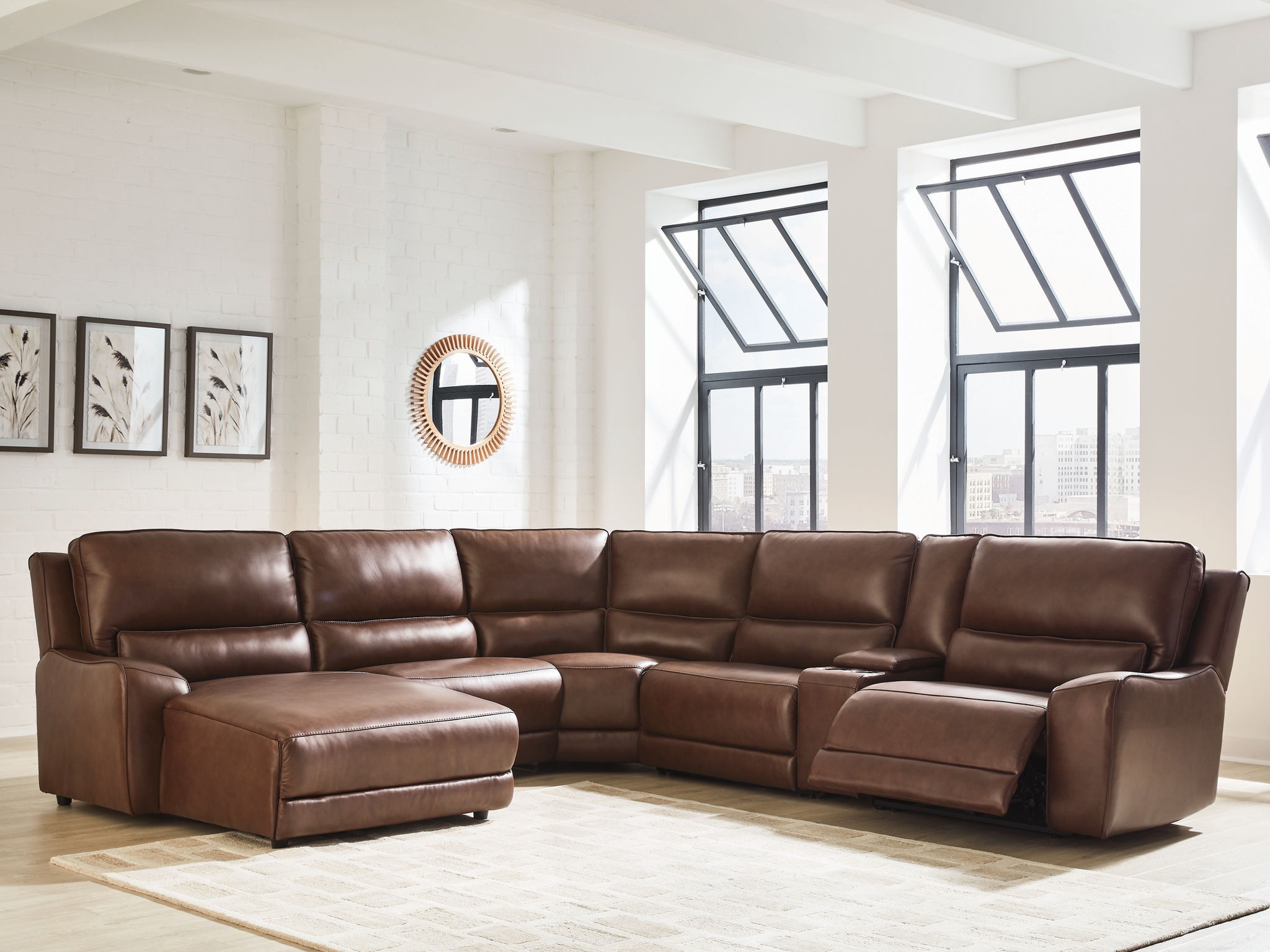 Dark brown power reclining sectional with chaise seats and wide armrests