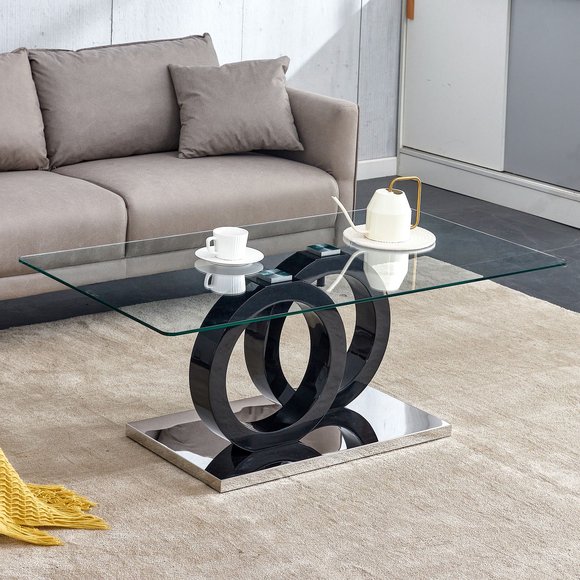 A Rectangular Modern And Fashionable Coffee Table With Tempered Glass Tabletop And Black Legs Suitable For Living Room