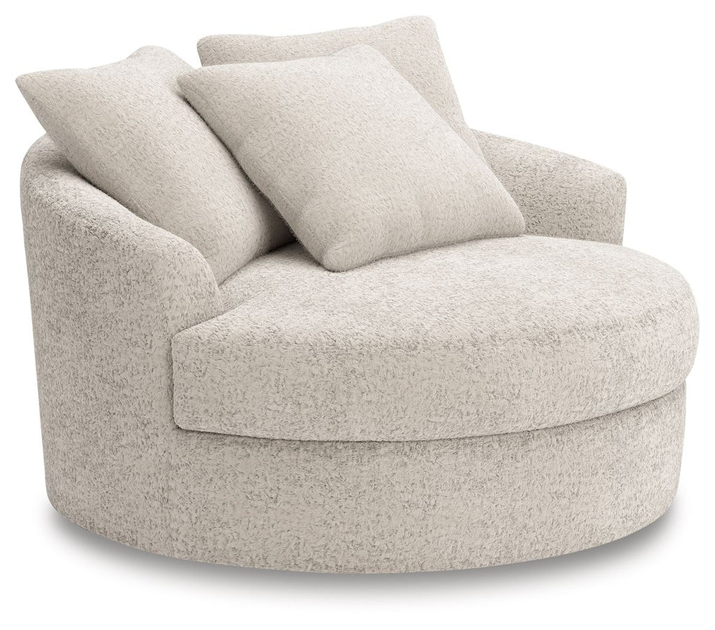 Swivel accent chair with rounded arms and boucle-style upholstery, light beige.