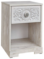 Whitewash one-drawer night stand with ornate carved drawer front and open shelf