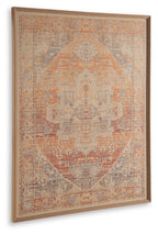 Framed wall art with distressed geometric pattern in orange-red and blue tones