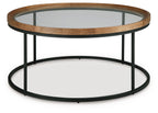 Round side table with clear glass top, light brown wood rim, black metal support frame, lower shelf
