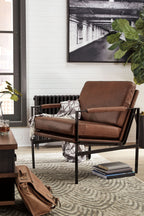 Dark brown leather-look accent chair with padded armrests and wide backrest.