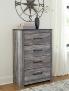 Gray wood four-drawer chest with dark bar handles and square tapered legs