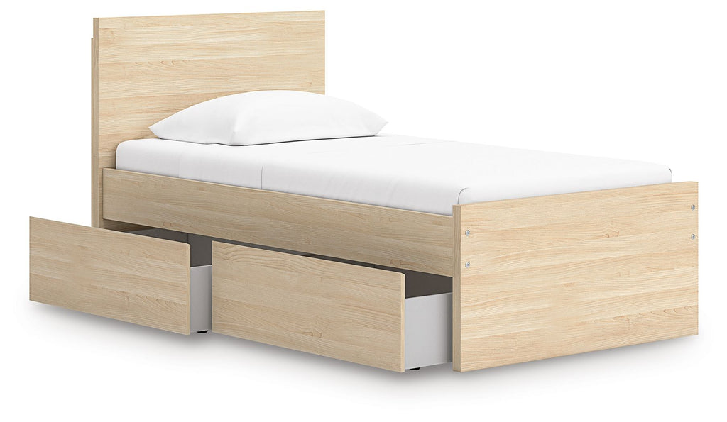 Light brown wood platform bed with panel frame and side storage drawers; gray legs visible.