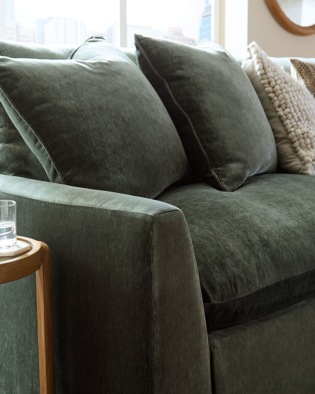 Jade green sectional sofa arm and seat cushion with textured fabric
