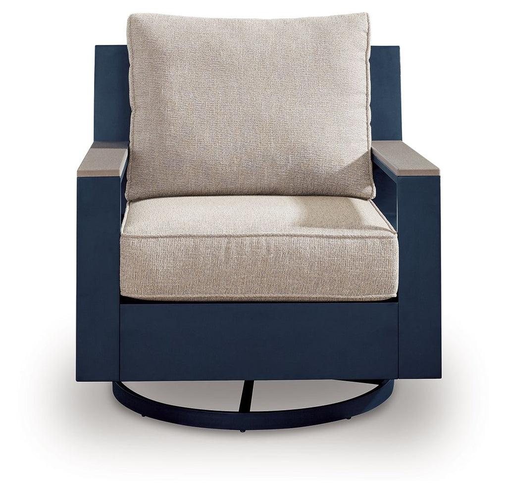 Swivel glider chair with cushion, blue body and beige seat with square back pillow
