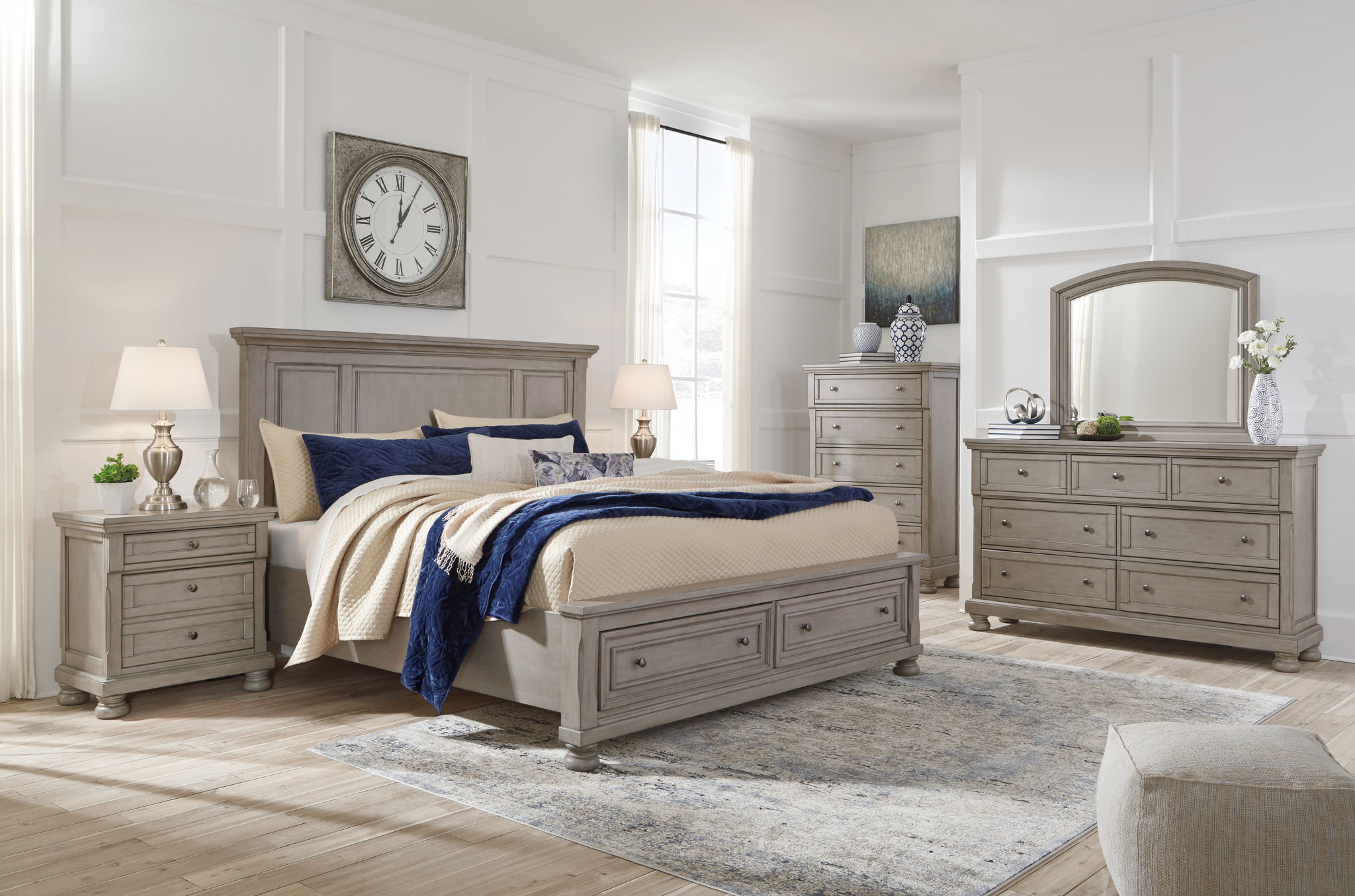 Gray panel bedroom set with bed, dresser, and arched mirror
