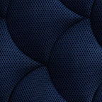 Blue quilted mattress cover with raised wave stitching pattern