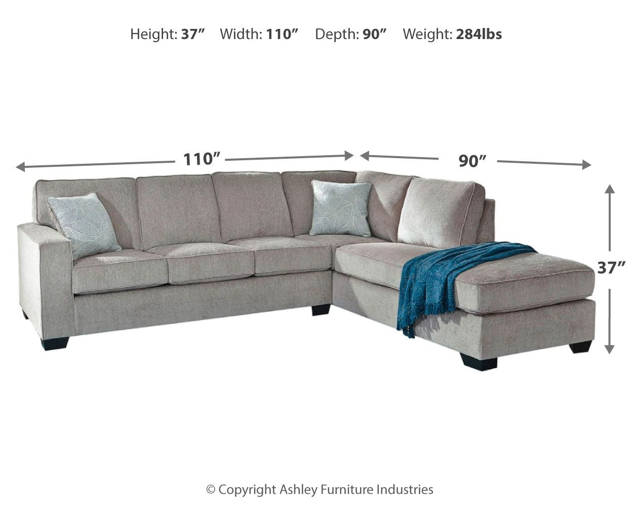 Light gray sectional sleeper sofa with right chaise and throw blanket on the ottoman