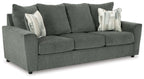 Stairatt sofa front view with three seat cushions, tall back, and white patterned throw pillows