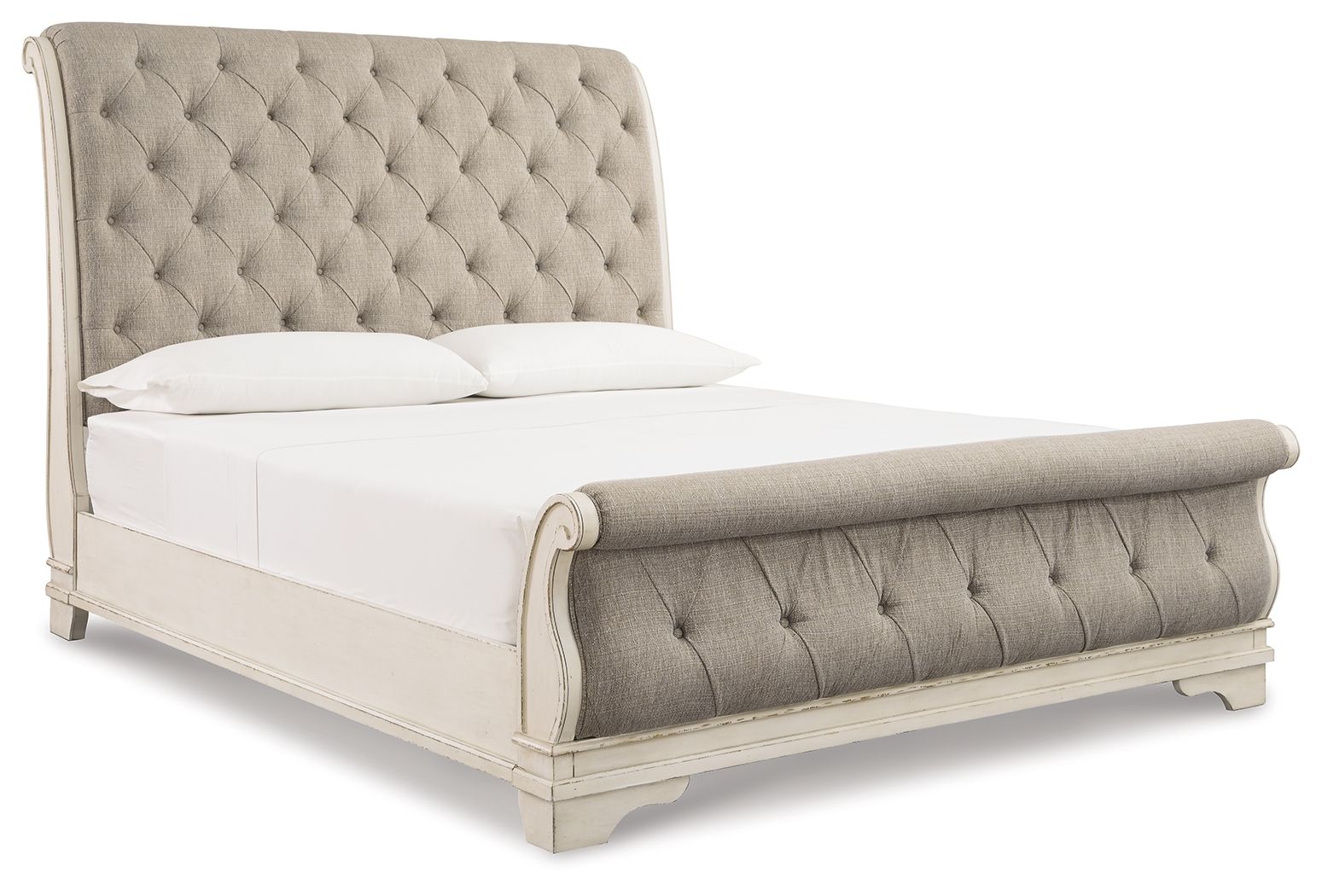 Light gray upholstered sleigh bed with tufted headboard and curved rail