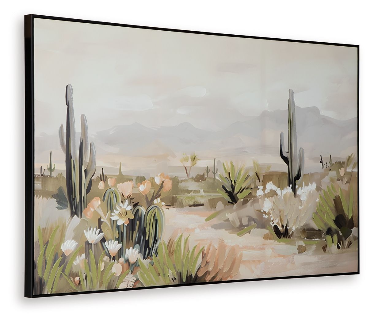 Framed wall art with cactus silhouettes and white flowers over sandy desert landscape