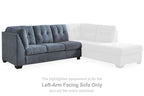 Blue-gray sectional sofa with left arm and chaise end, tufted back, cushioned seat