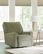 Green fabric rocker recliner chair with tall backrest and padded side arms.