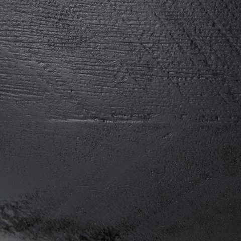 Brynnington black bowl surface close-up with fine textured grain