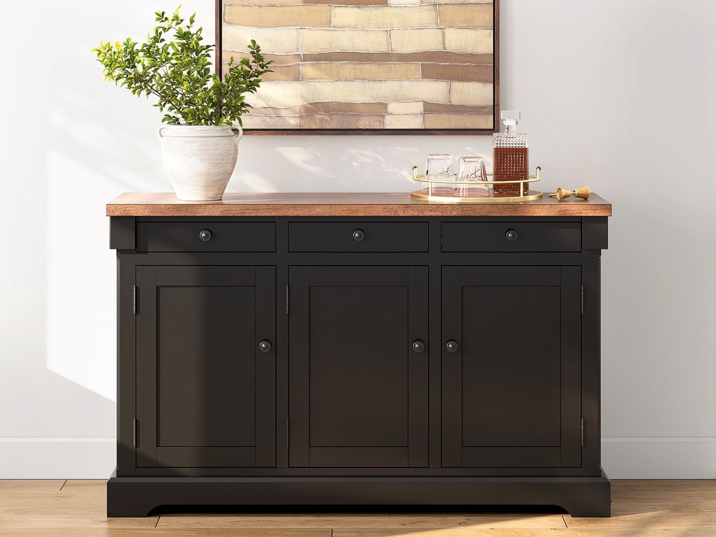 Dining room buffet cabinet with brown top and black cabinet doors with knobs